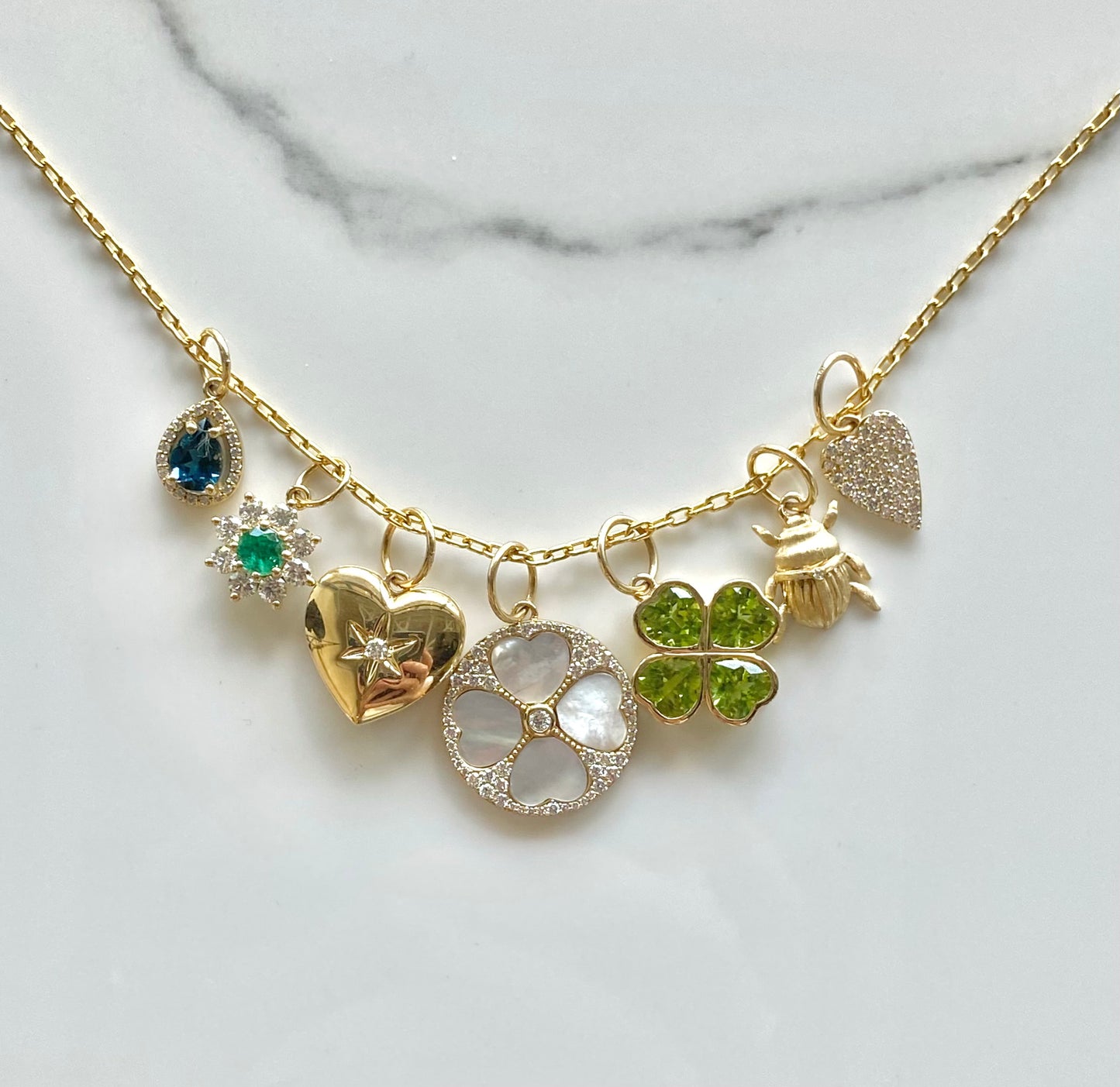 London Blue Topaz & Diamond Halo Pendant