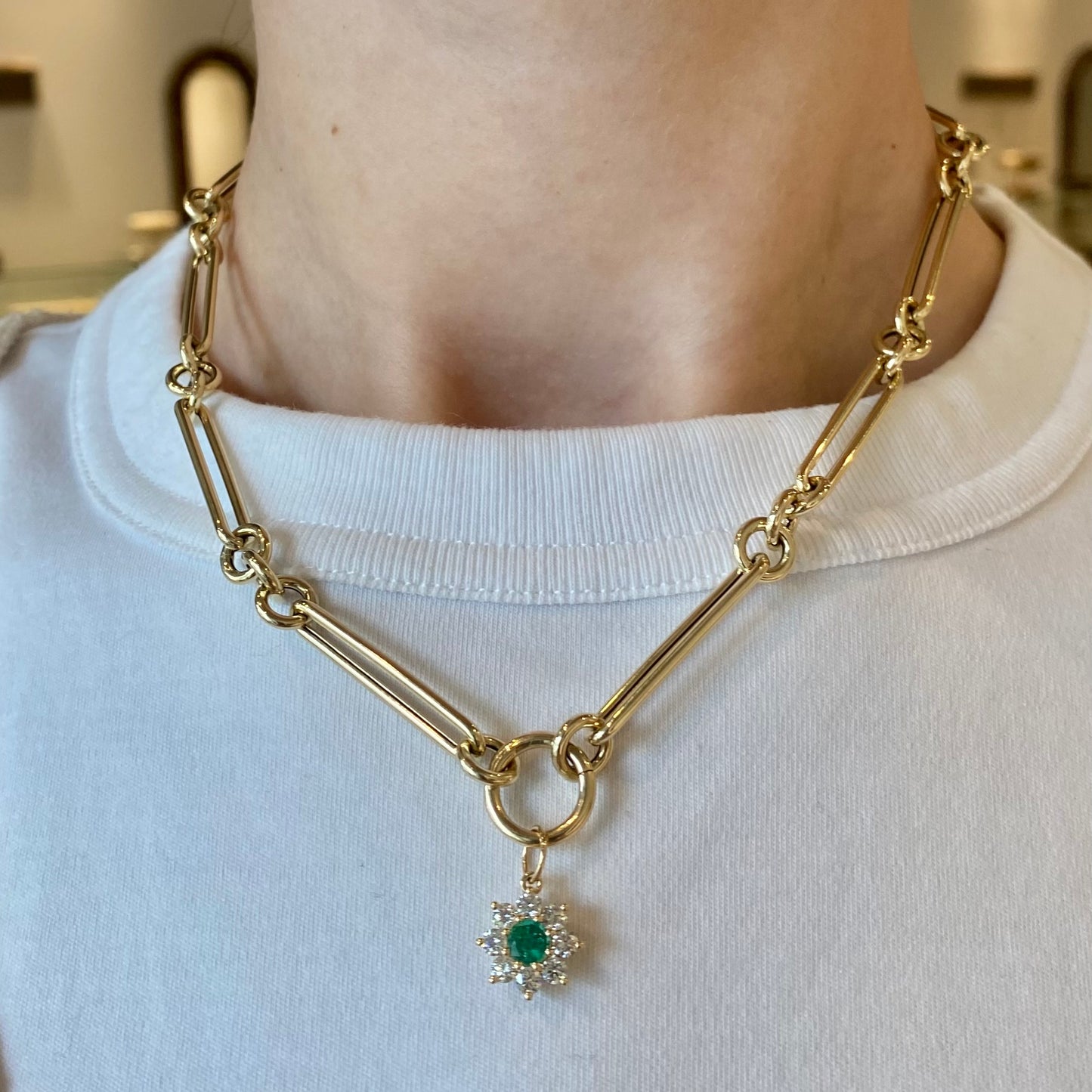 Emerald and Diamond Halo Flower Pendant