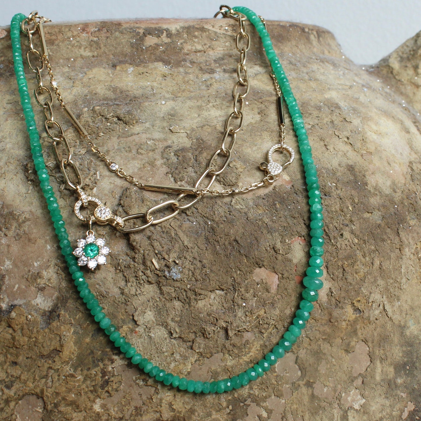 Emerald and Diamond Halo Flower Pendant