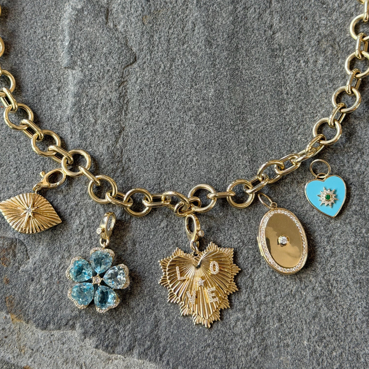 Light Blue Topaz & Diamond Flower Pendant