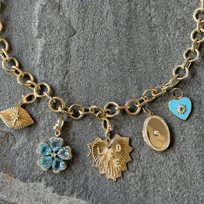 Light Blue Topaz & Diamond Flower Pendant