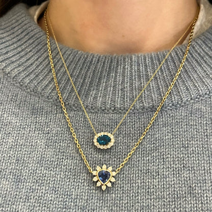 Oval London Blue Topaz Necklace with Diamond Halo