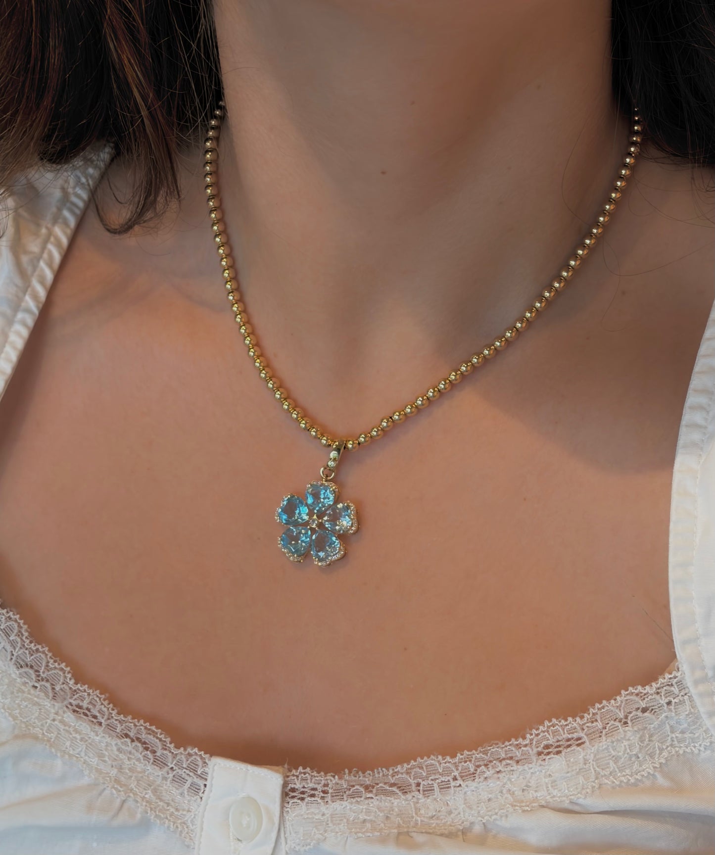 Light Blue Topaz Diamond Flower Pendant