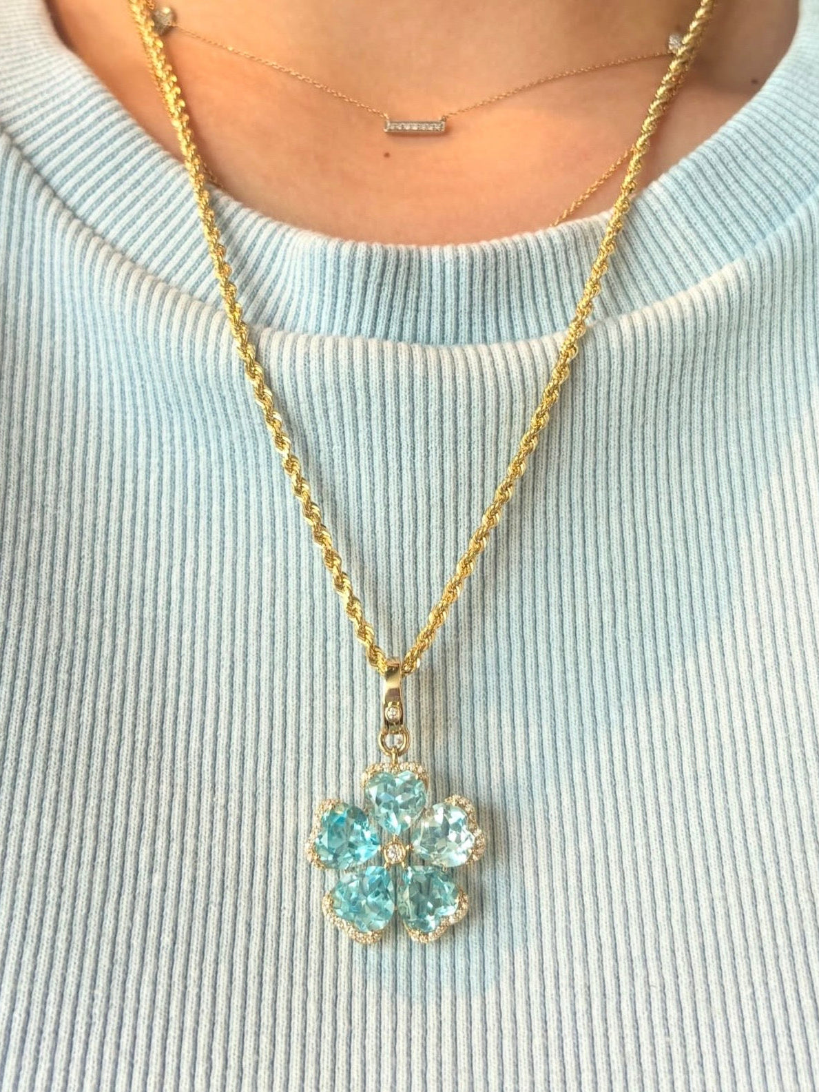 Light Blue Topaz & Diamond Flower Pendant