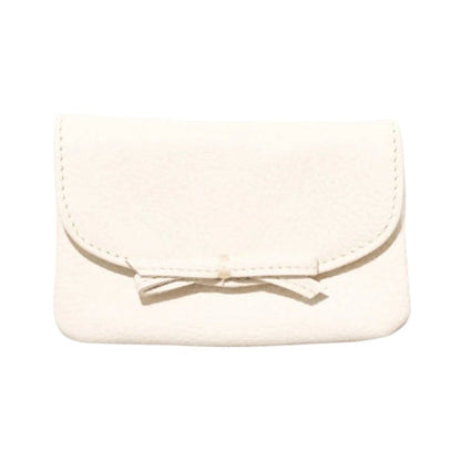 Beige pouch with a bow on a white background
