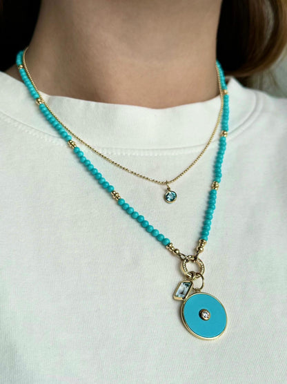 Round Blue Topaz Pendant